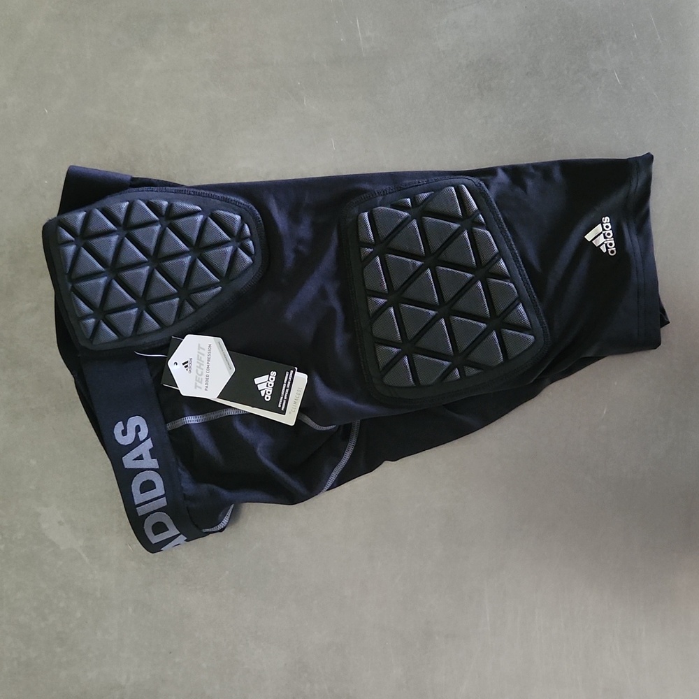 Boy's Adidas football padded compression shorts, size XL, color Black